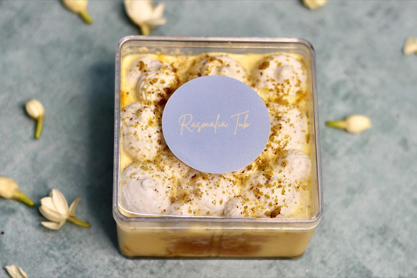 Rasmalai tres leches box with a lilac label